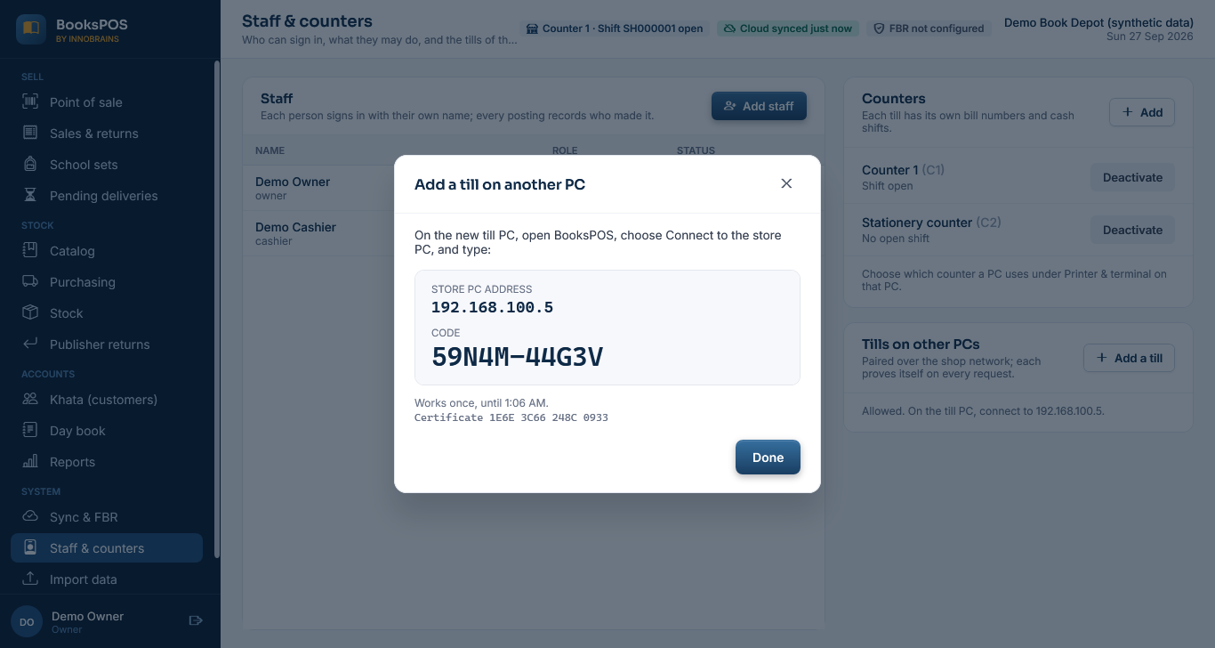 The Add a till on another PC dialog showing the store PC address and a one-time code